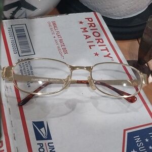 Versace gold frame glasses with display kense